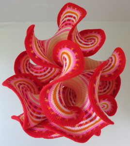 Hyperbolic Disk with Red Rim by Gabriele Meyer.
